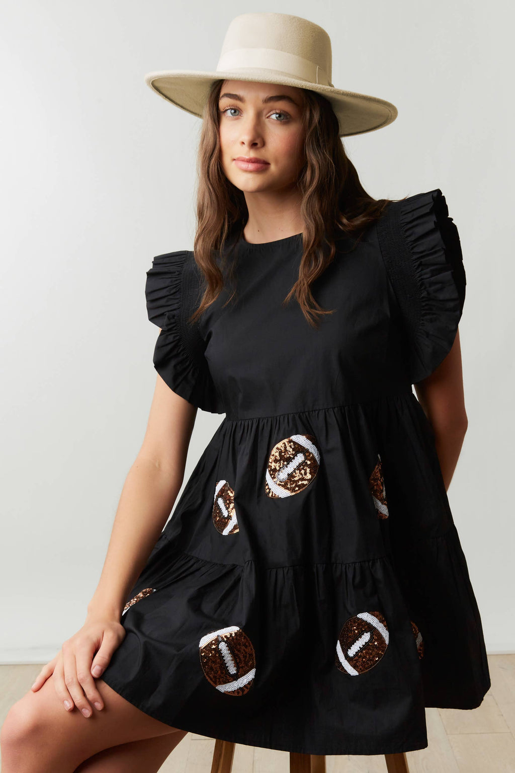 Touchdown Chic: Black Sequin Football Dress - BFF Here