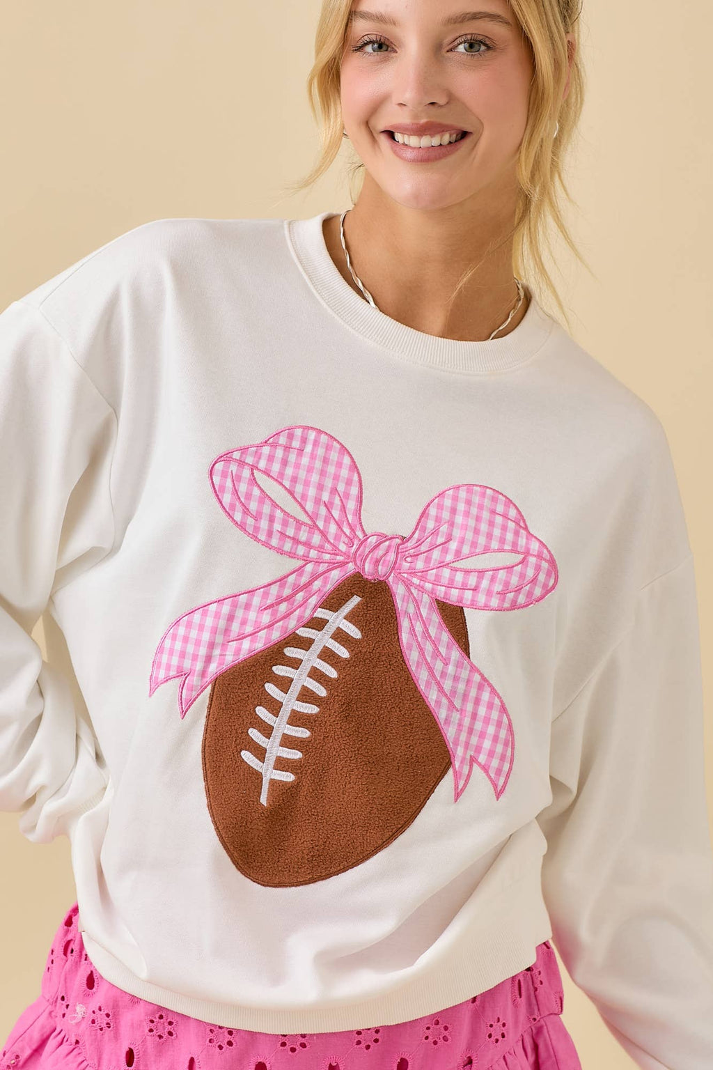 Touchdown & Tied with a Bow Sweatshirt by Main Strip - BFF Here