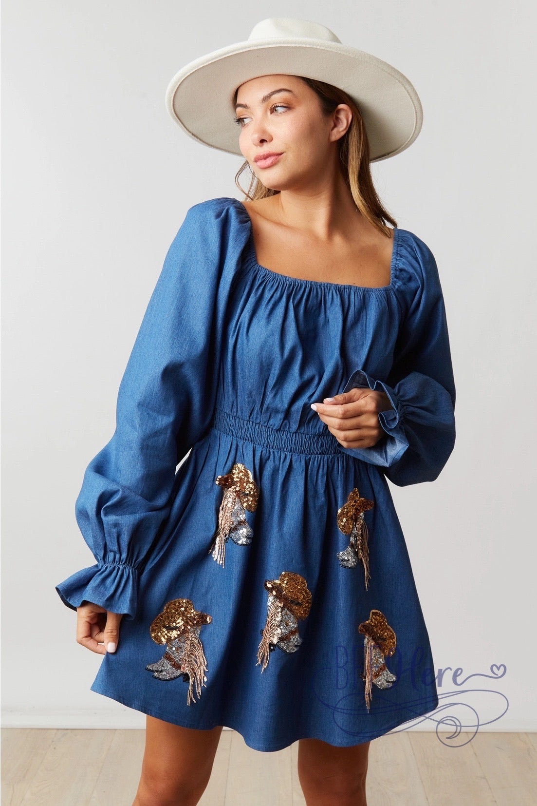 Cowgirl Couture: Denim Puff Sleeve Dress Featuring Boot and Hat Accents - BFF Here