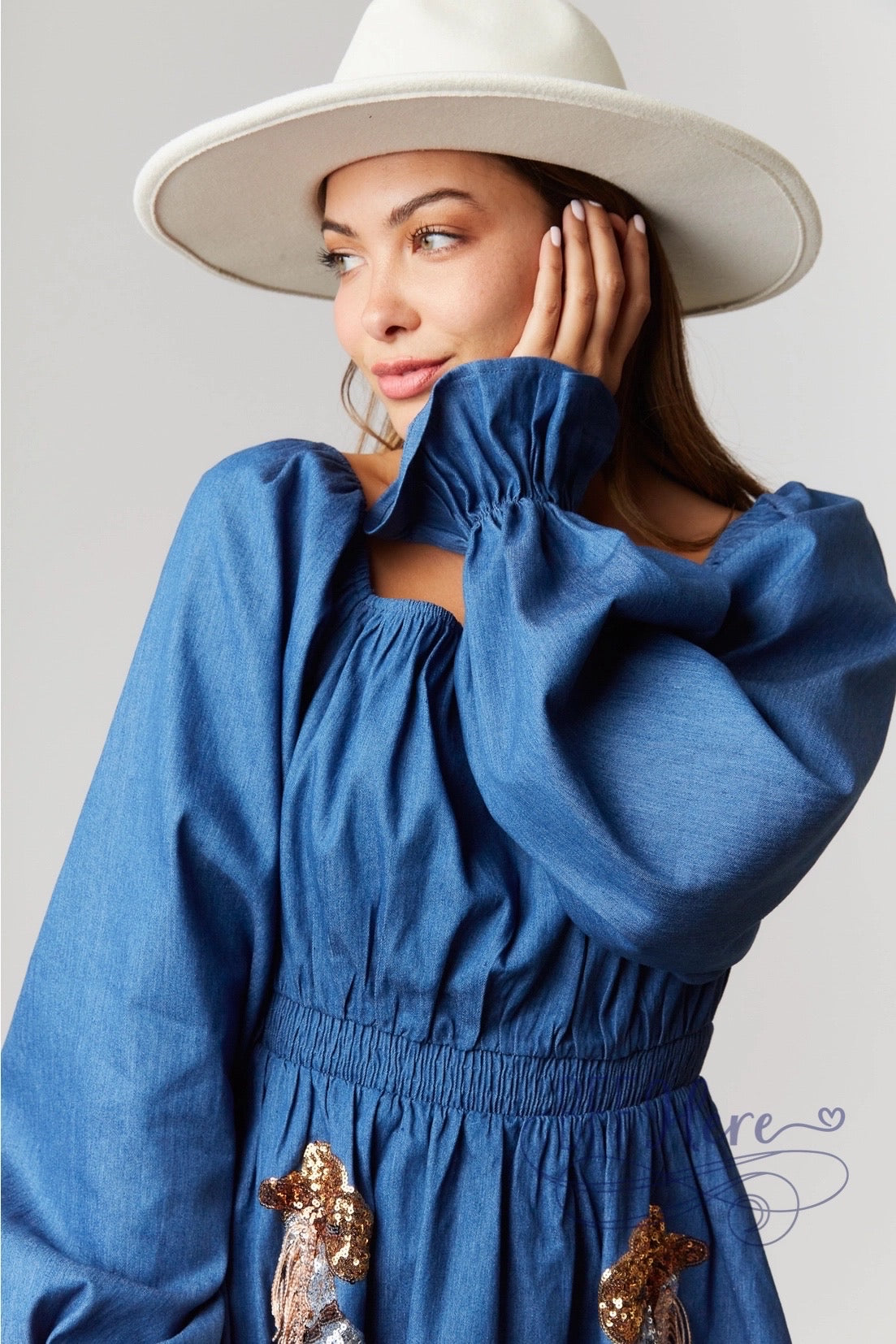 Cowgirl Couture: Denim Puff Sleeve Dress Featuring Boot and Hat Accents - BFF Here