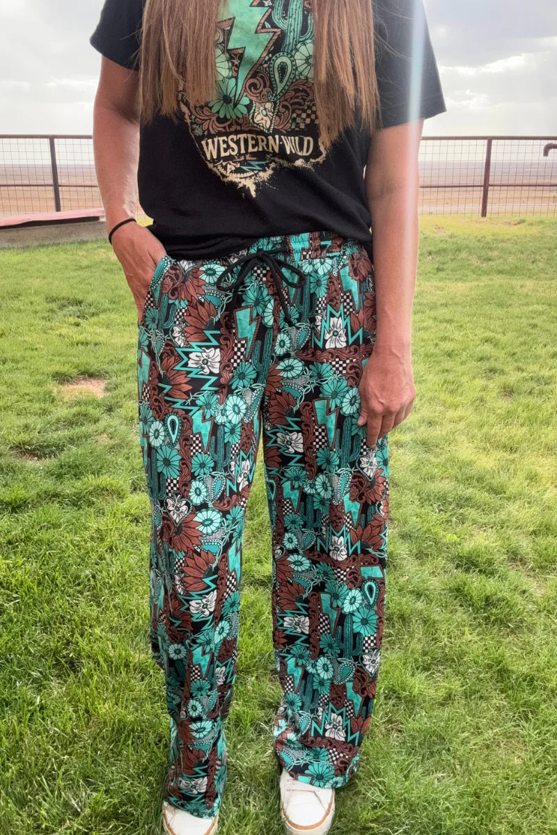 Tattoos In Turquoise Pants by Sterling Kreek - BFF Here