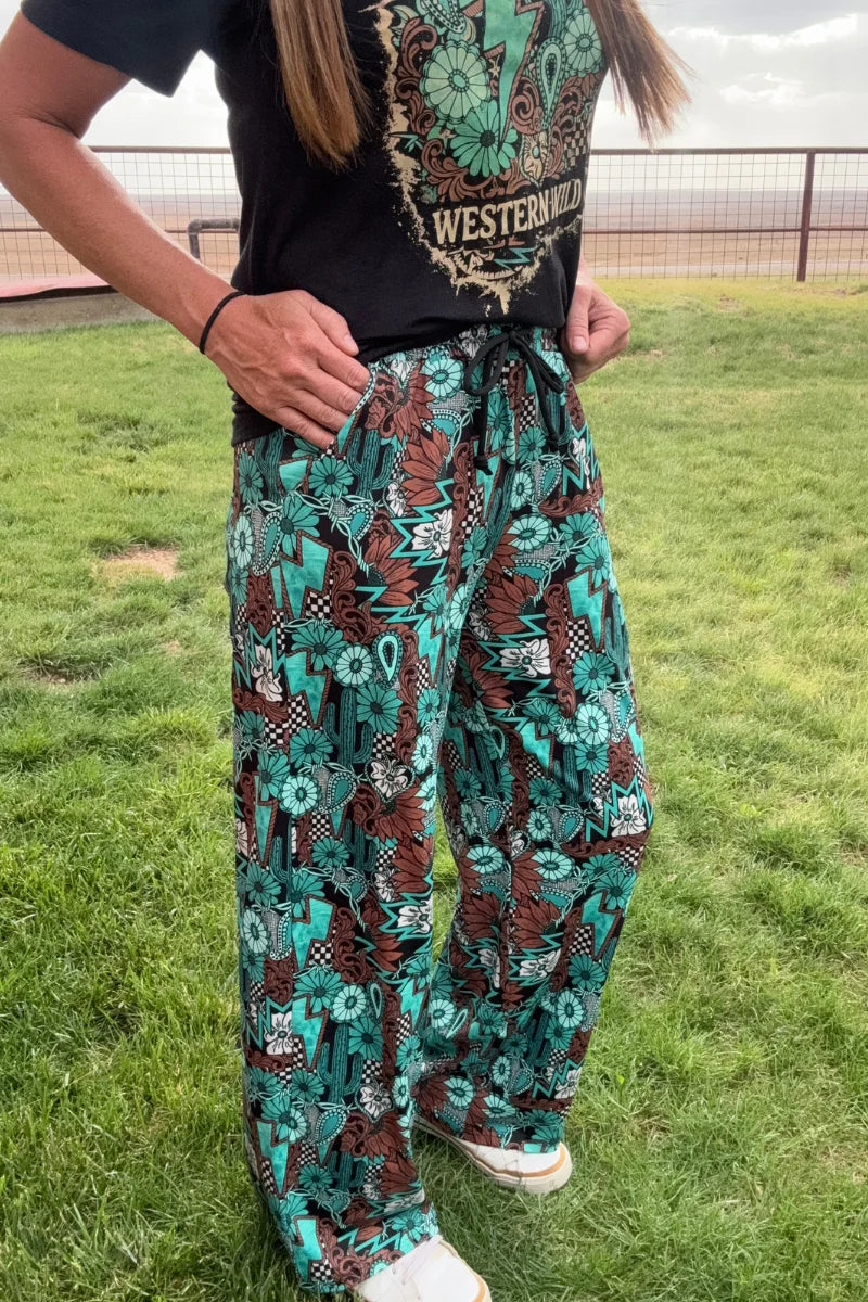 Tattoos In Turquoise Pants by Sterling Kreek - BFF Here