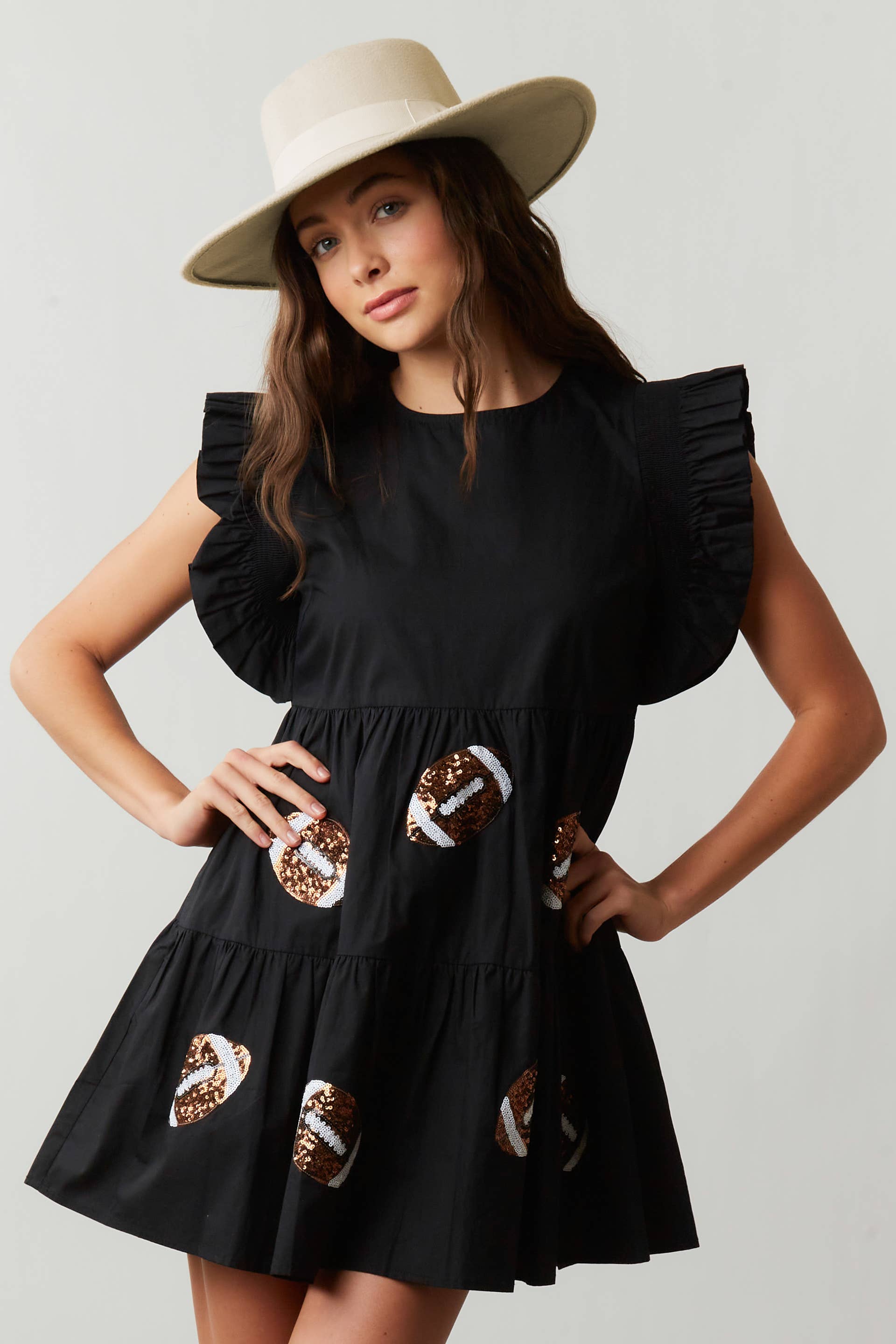 black dress with sequin footballs Touchdown Black Sequin Football Dress Shop the Mint